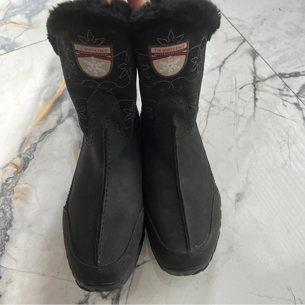 The North Face Women's Black Primaloft Winter Boots with fur & snowflake design
